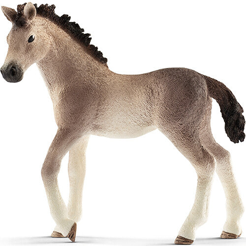 Schleich dierenfiguurtje van een beige Andalusiër veulen.