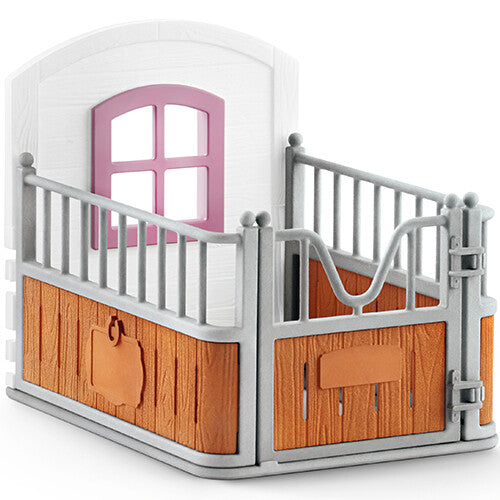 Detail van de Schleich paardenbox met roze raam en open hek.