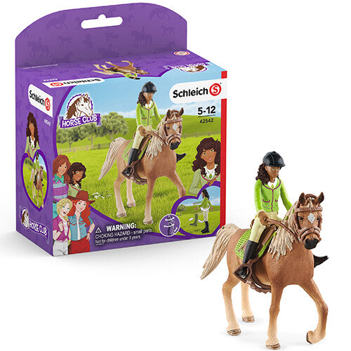 De Schleich Horse Club speelset verpakking met de figuren van Sarah en Mystery ernaast.