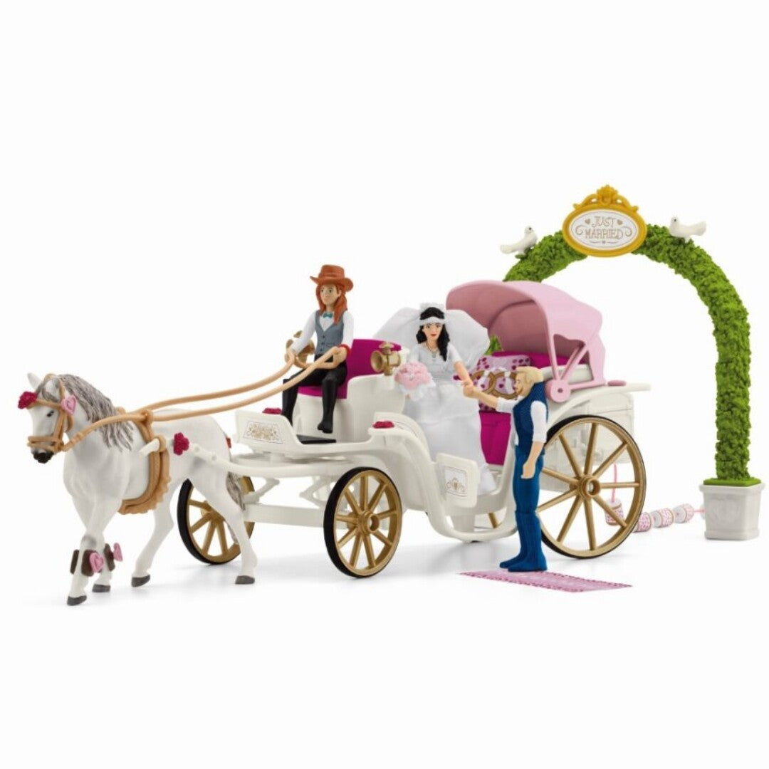 Schleich Horse Club trouwkoets speelset met wit paard, koets, bruidspaar en koetsier, en een 'Just Married' boog.