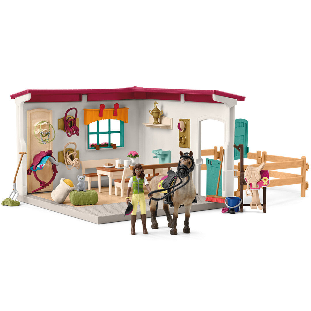 Schleich Horse Club zadelkamer speelset met paard, ruiterfiguur en diverse accessoires.