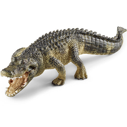 Schleich alligator dierenfiguurtje met open bek, schuin van bovenaf gefotografeerd.
