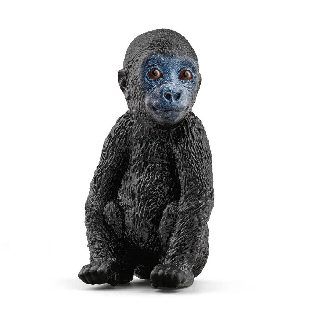 Schleich Wild Life baby gorilla speelgoedfiguurtje zittend, met een blauw gezicht.