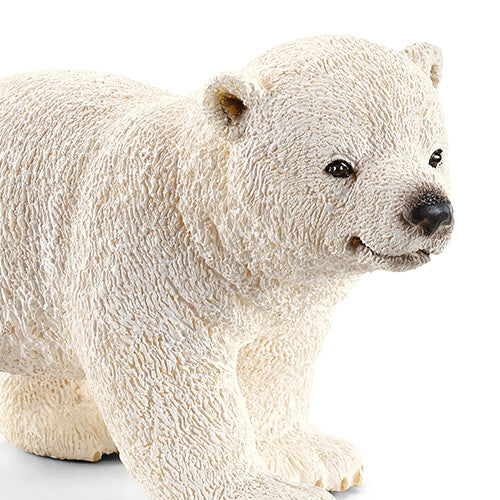 Detailopname van het Schleich speelgoedfiguurtje van een ijsbeerjong.