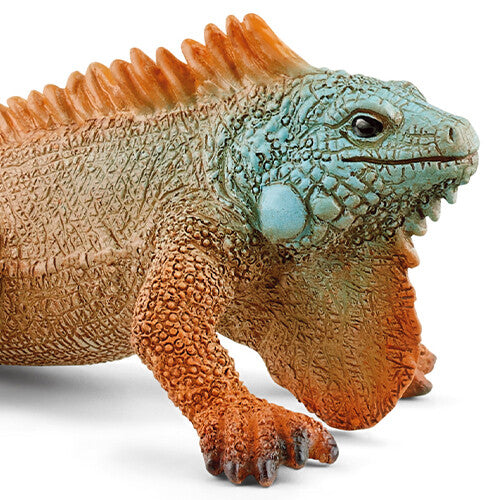 Detailopname van de kop en voorpoten van het Schleich leguaan dierenfiguurtje.