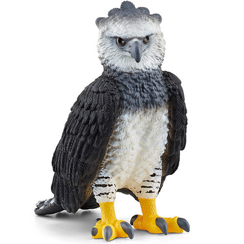 Schleich dierenfiguurtje van een harpij met zwart-witte veren en gele poten.