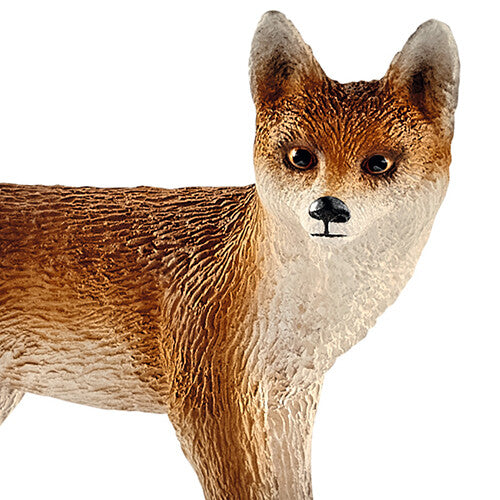 Detailopname van de kop van het Schleich dierenfiguurtje van een vos.