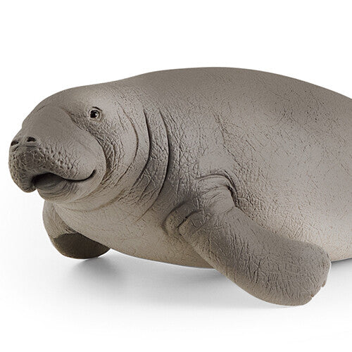 Detailopname van het Schleich dierenfiguurtje van een grijze zeekoe.