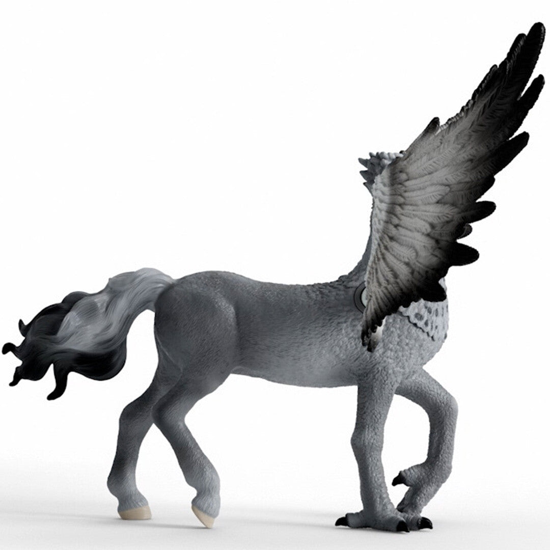 Schleich dierenfiguurtje van Scheurbek van de zijkant gezien met één opgestoken vleugel.