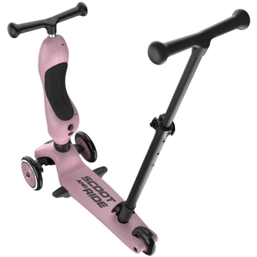 De roze Scoot & Ride 2-in-1 step in staande modus, met losse stang, op een witte achtergrond.