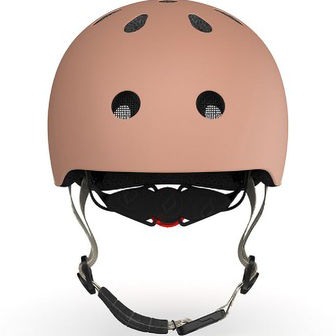 Voorkant van de Scoot & Ride kinderhelm in beige kleur met ventilatiegaten.