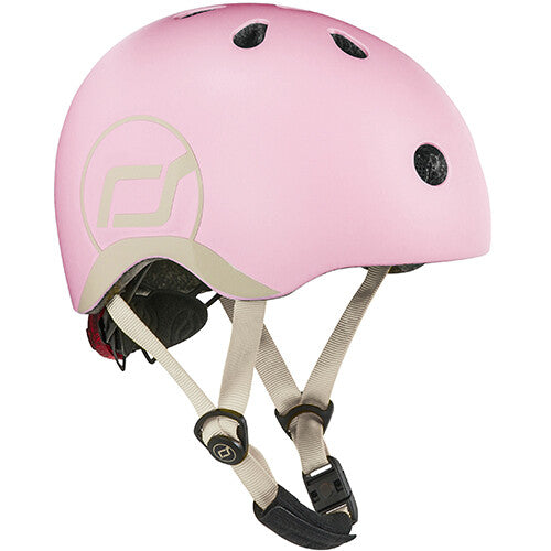 Roze Scoot & Ride kinderhelm met logo en beige kinband.