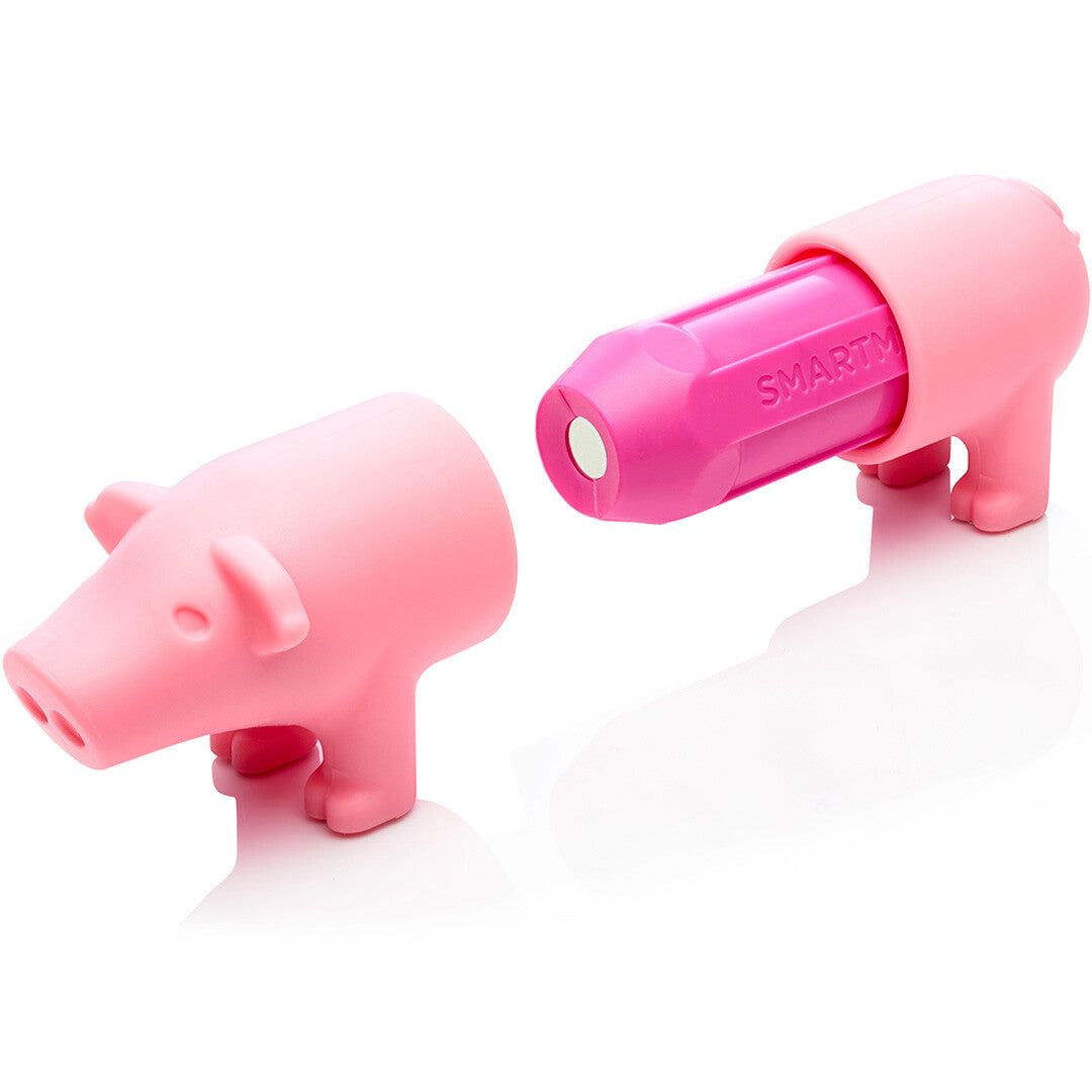 Een roze Smartmax varken van het magnetisch bouwspeelgoed, opengesplitst met de roze magneetstaaf zichtbaar.