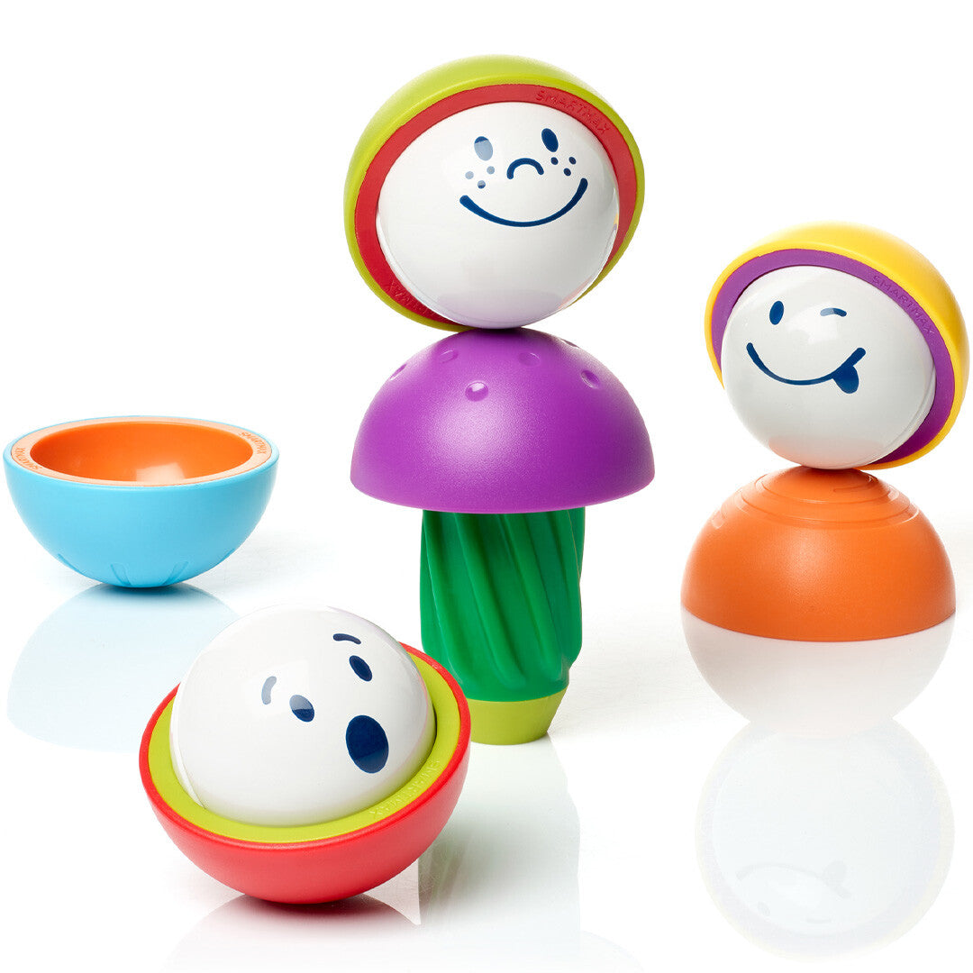 Smartmax magnetisch puzzelspel met kleurrijke figuren en losse onderdelen op een witte achtergrond.