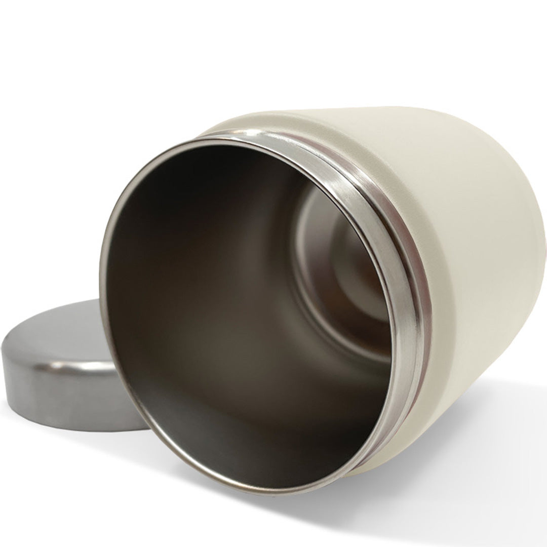 Open Smikkels crème thermos voedselpot met zicht op de roestvrijstalen binnenkant.
