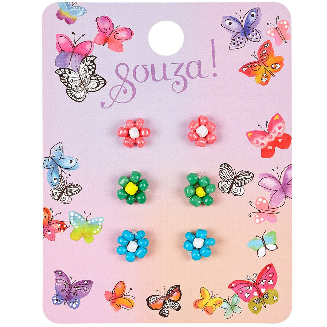 Souza for kids kinder oorbellen Tyra verpakking met drie paar bloemvormige plastic oorbellen in roze, groen en blauw.