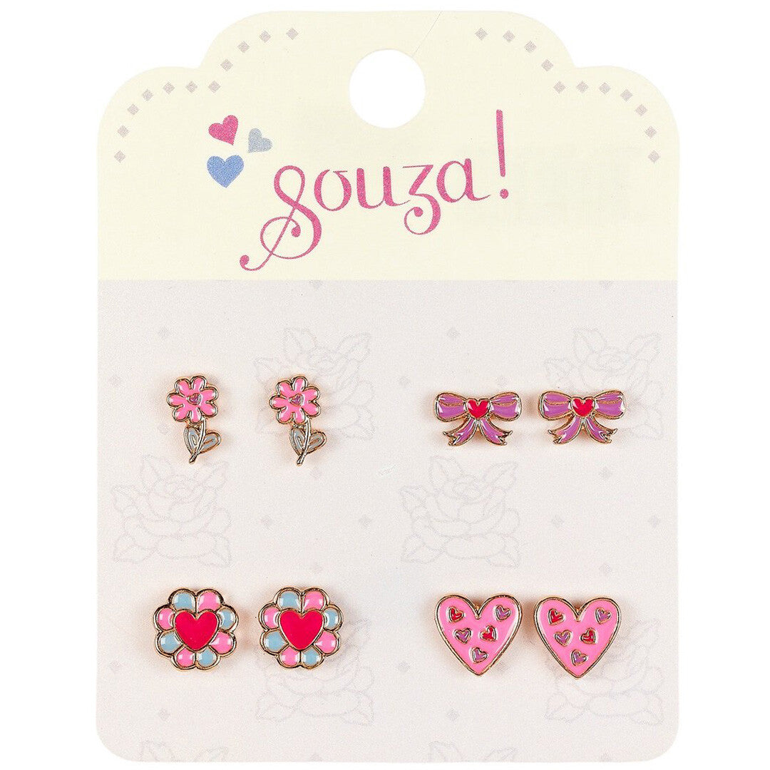 Souza for Kids verpakking met vier paar kinder oorbellen in de vorm van roze bloemen, strikjes en hartjes.