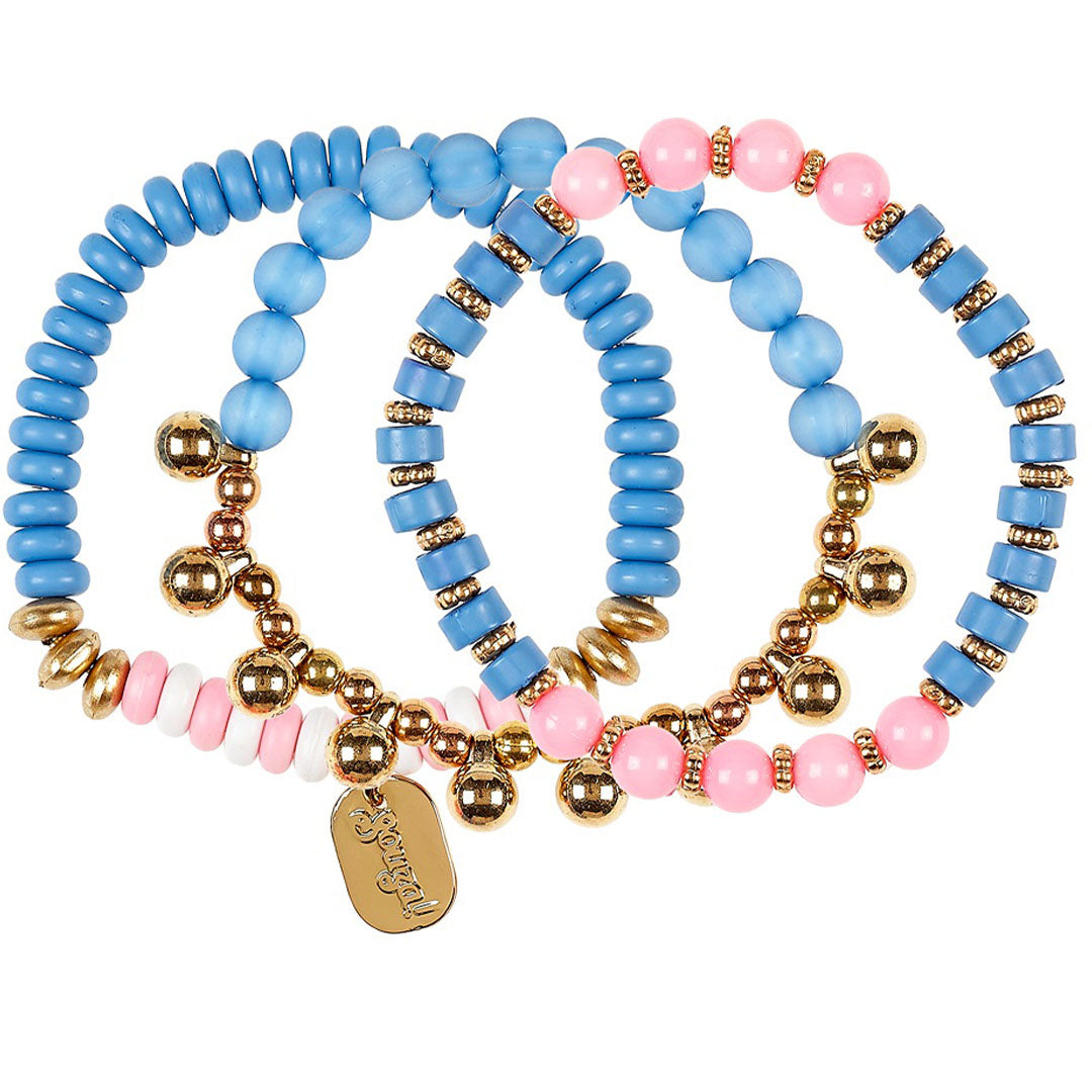 Souza for Kids set van drie kinderarmbanden met blauwe, roze en witte kralen en goudkleurige bedeltjes.