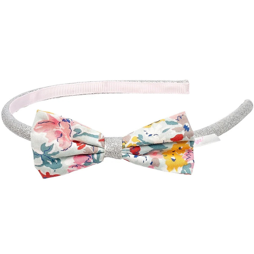Souza for Kids kinderhoofdband met zilveren glitter en een veelkleurige gebloemde strik.