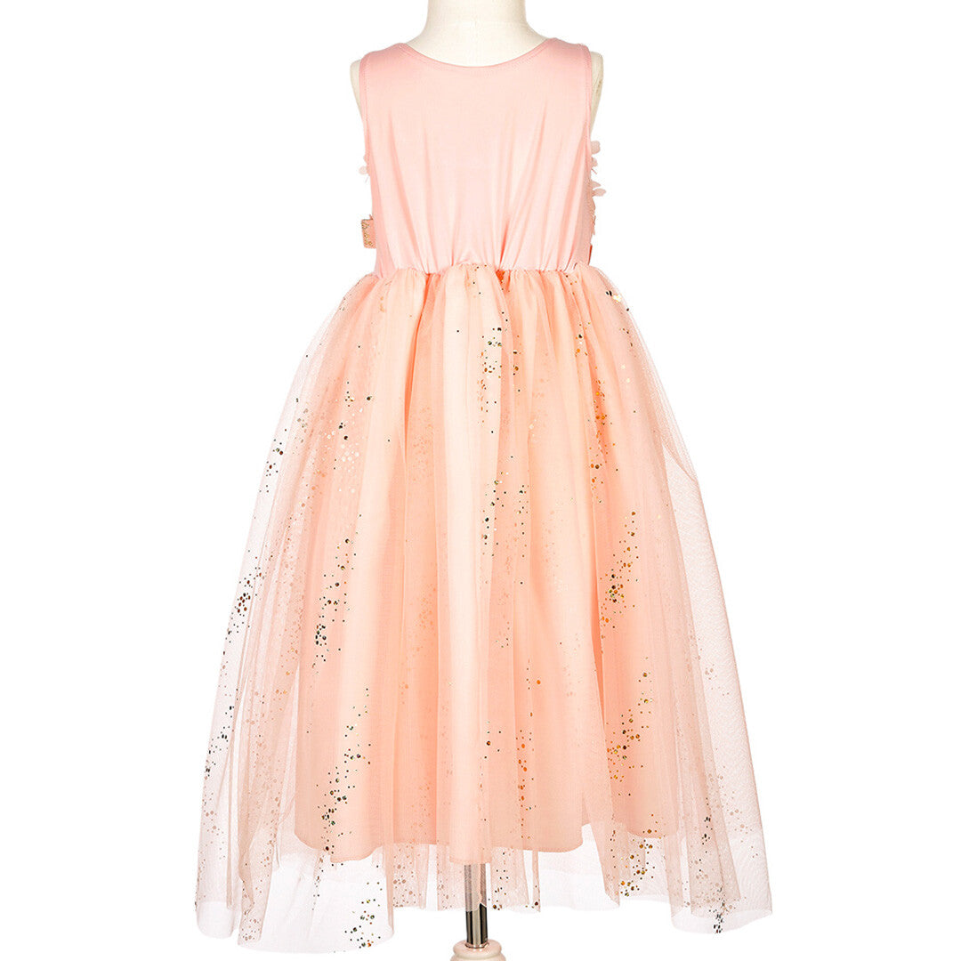 Achterkant van de roze kinderfeestjurk met glitterrok op een paspop.