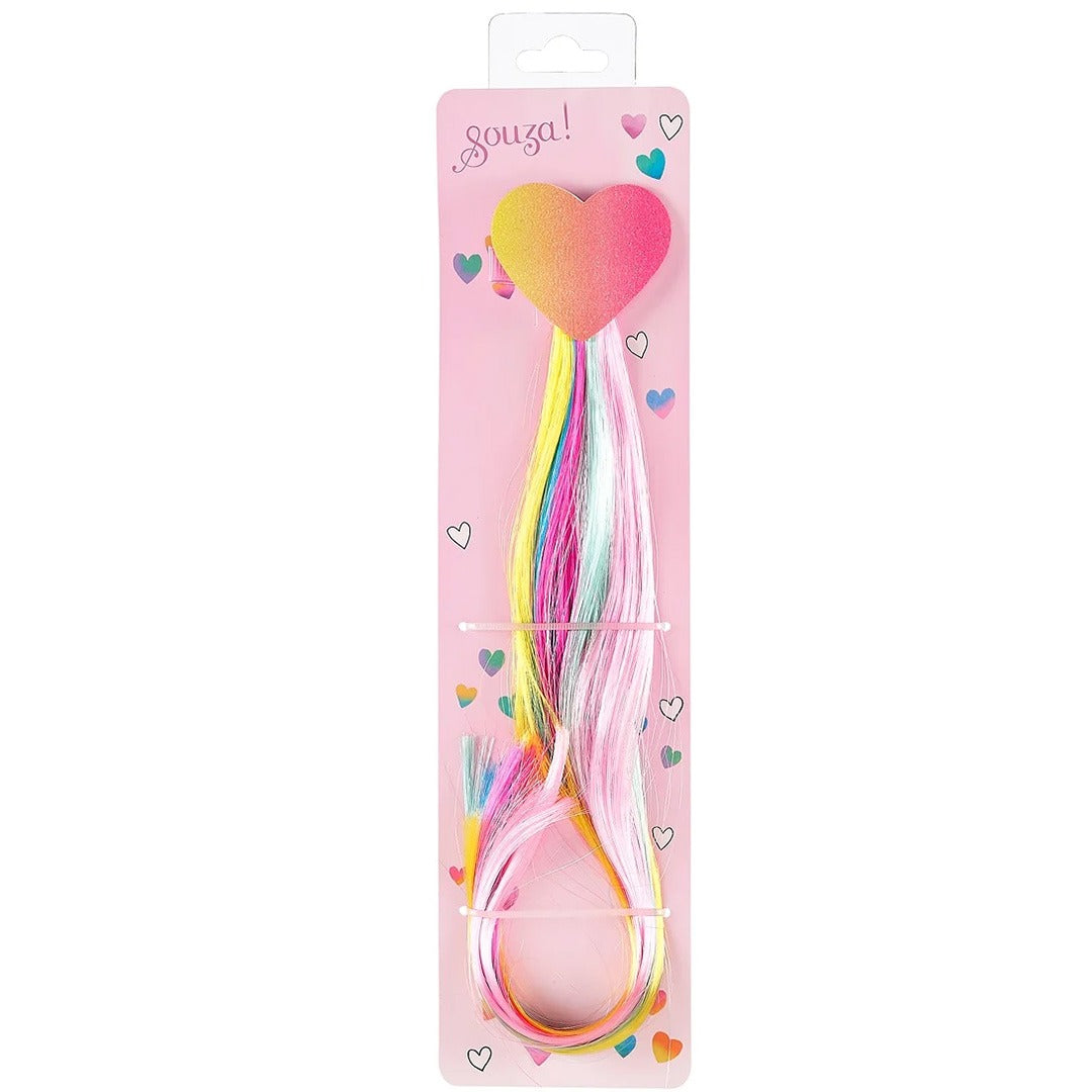 Verpakking van een Souza for Kids haarclip met veelkleurige regenboog extensions en een hartvormige clip.