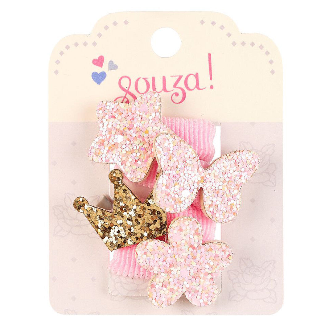 Verpakking van Souza for Kids haarelastiekjes met een roze glitter ster, vlinder en bloem, en een gouden glitter kroon.