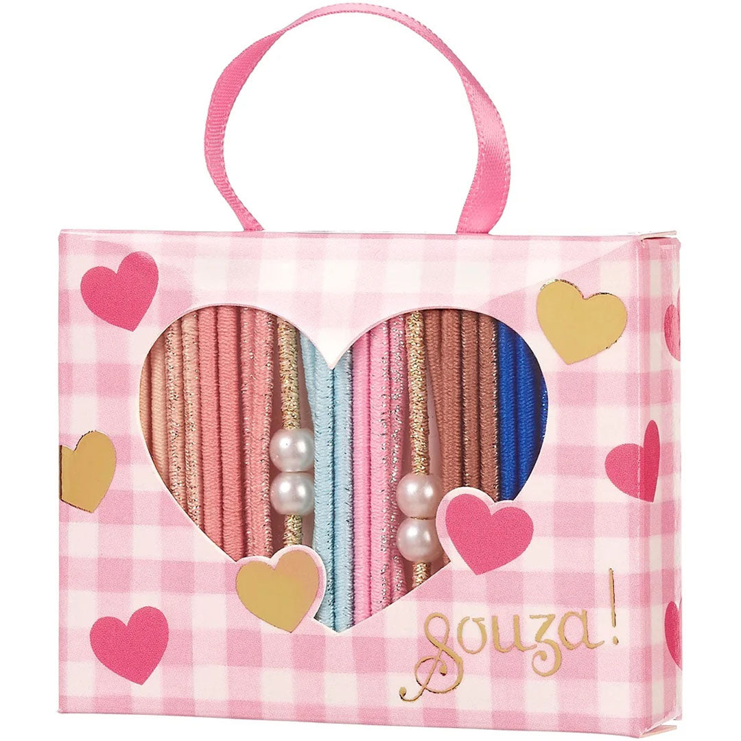 Souza for kids kinder haarelastiekjes in een roze geruite verpakking met hartjes en een hartvormige uitsparing.