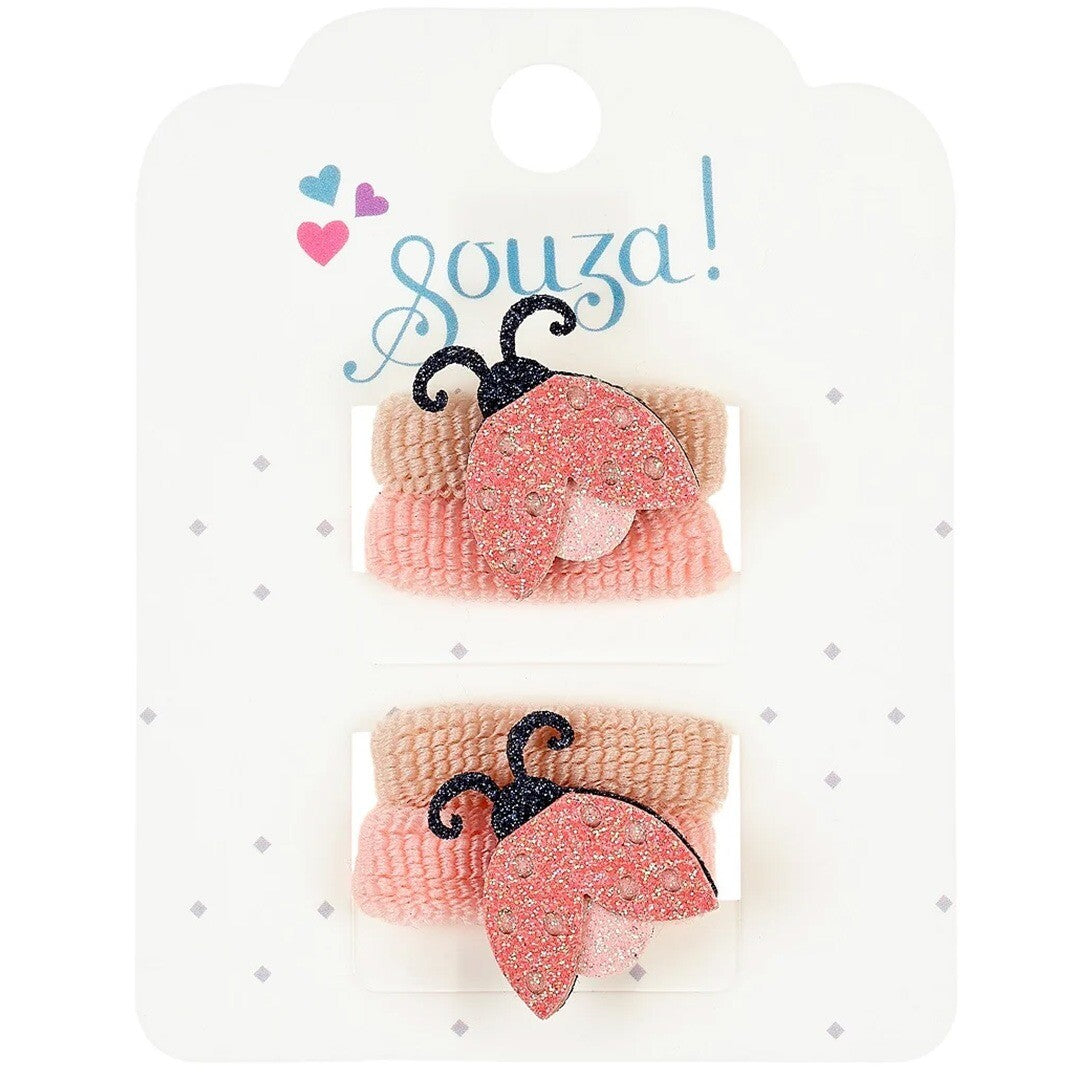 Verpakking van Souza for Kids haarelastiekjes voor kinderen met roze lieveheersbeestjes.