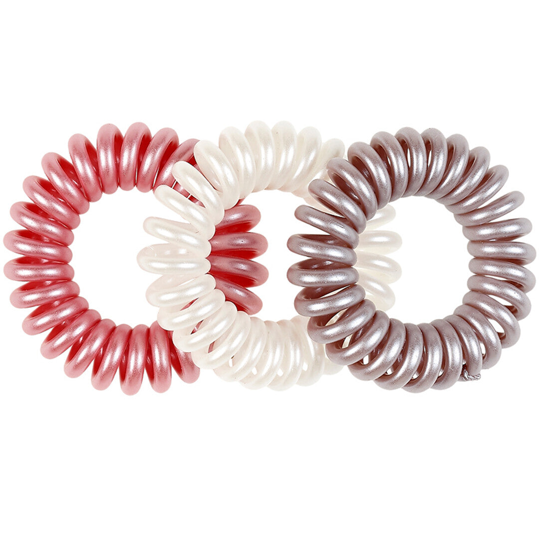 Souza for Kids set van drie parelmoer spiraal haarelastiekjes in roze, wit en grijs.