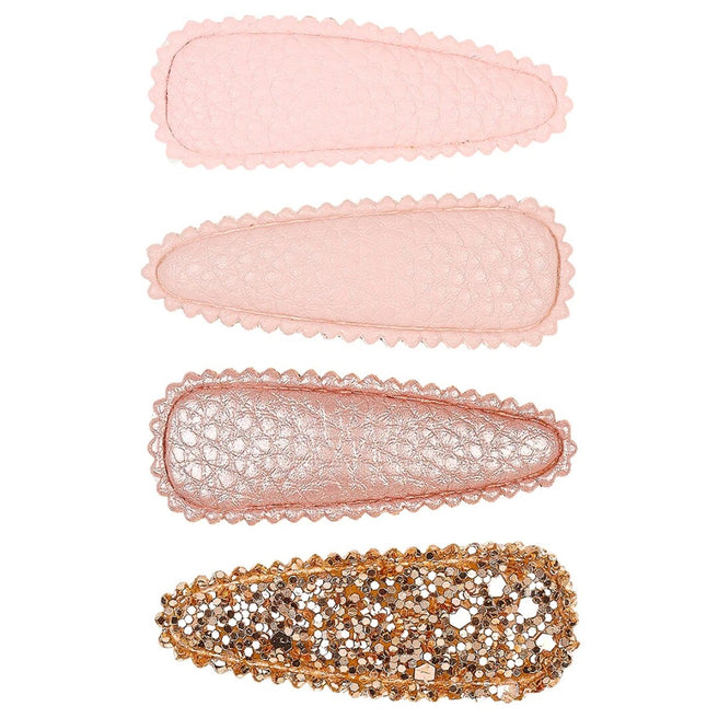 Souza for kids set van vier roze en goudkleurige haarspeldjes met verschillende texturen.