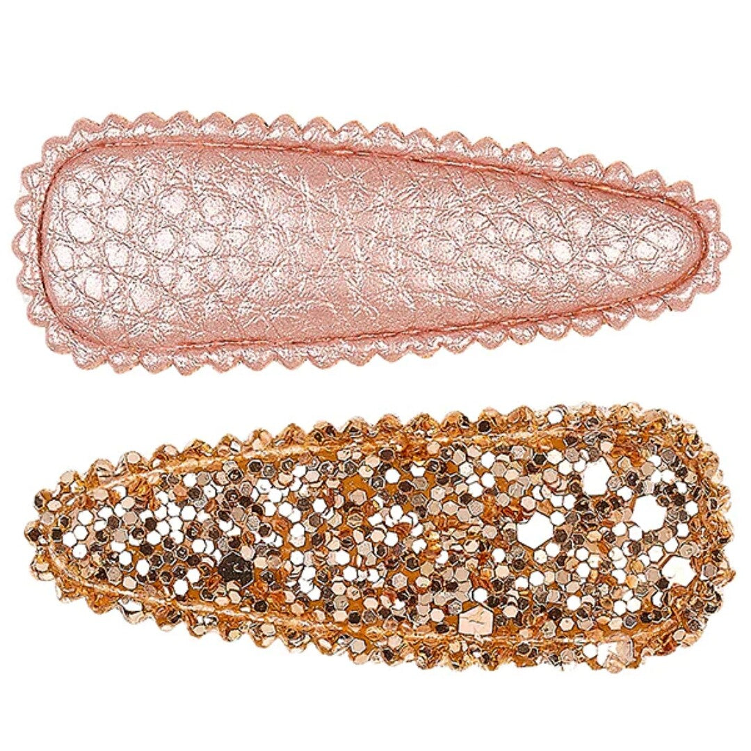 Souza for kids set van twee roze en goudkleurige haarspeldjes, waarvan één met textuur en één met glitter.