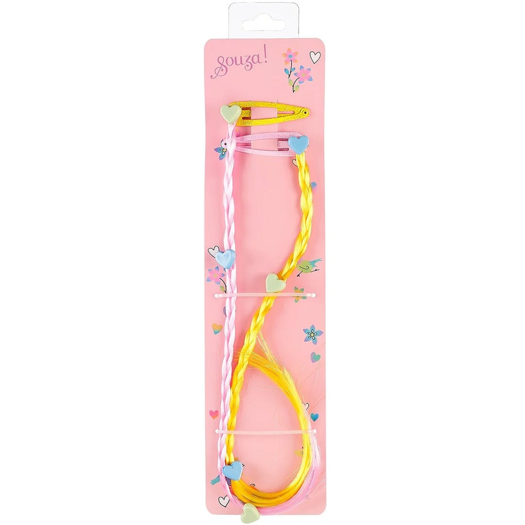 Souza for kids verpakking met twee haarspeldjes met roze en gele gevlochten haarextensies en hartjes.