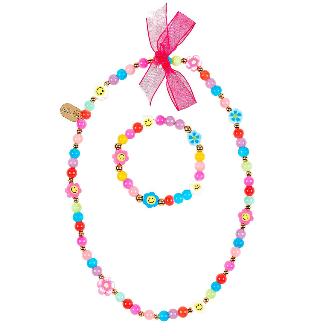 Souza for Kids veelkleurige kralen ketting en armband met bloemen en smileygezichtjes en een roze strik.