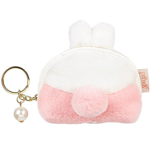 Achterkant van de roze kinderportemonnee met een pluizig konijnenstaartje en sleutelhanger.