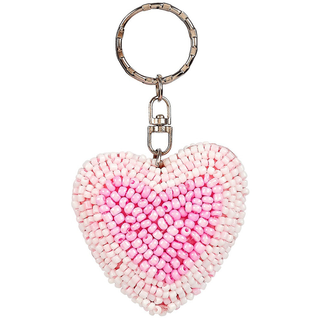 Souza for kids roze sleutelhanger in de vorm van een hart, versierd met roze kraaltjes.