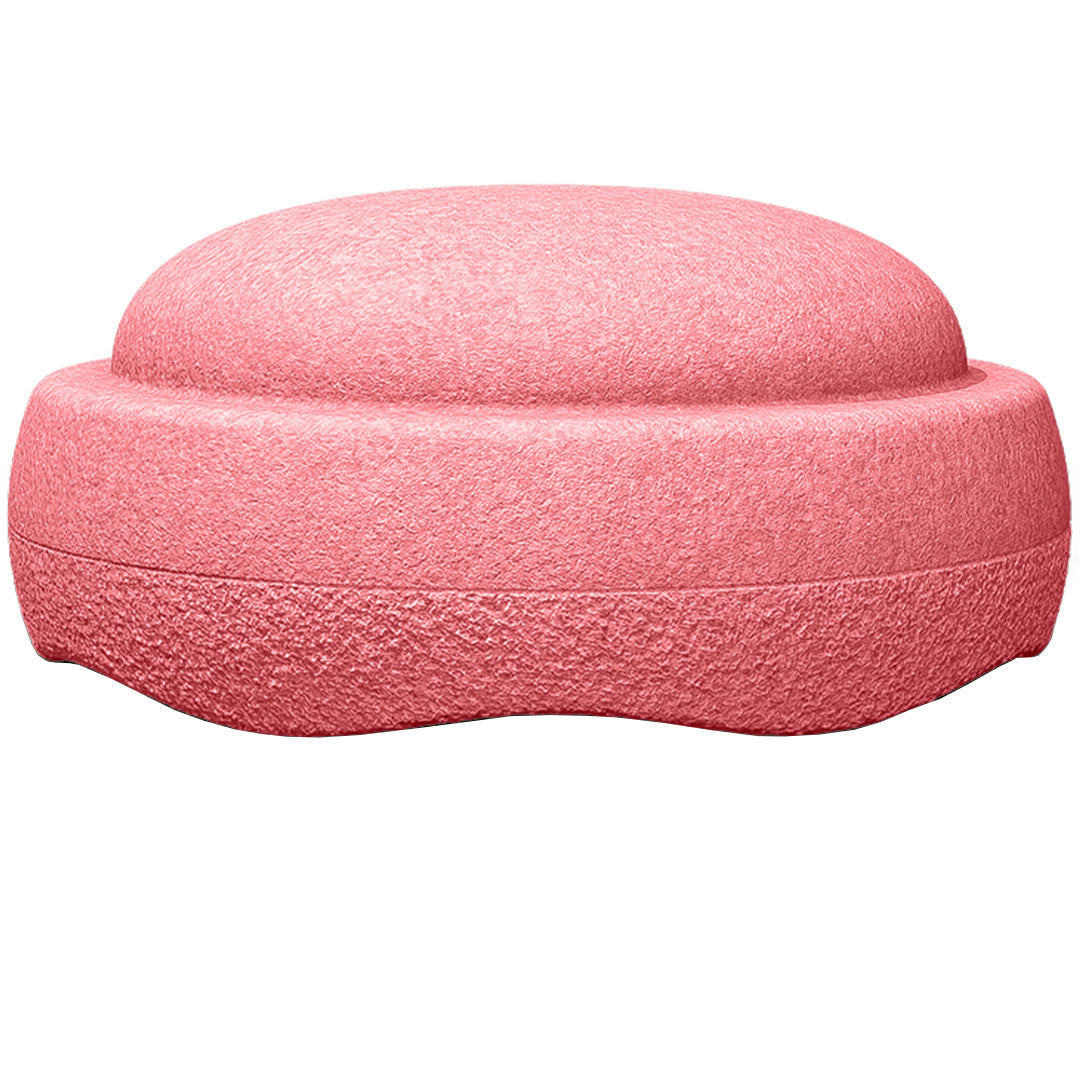 Een lichtroze stapelstein schuimrubberblok met textuur.