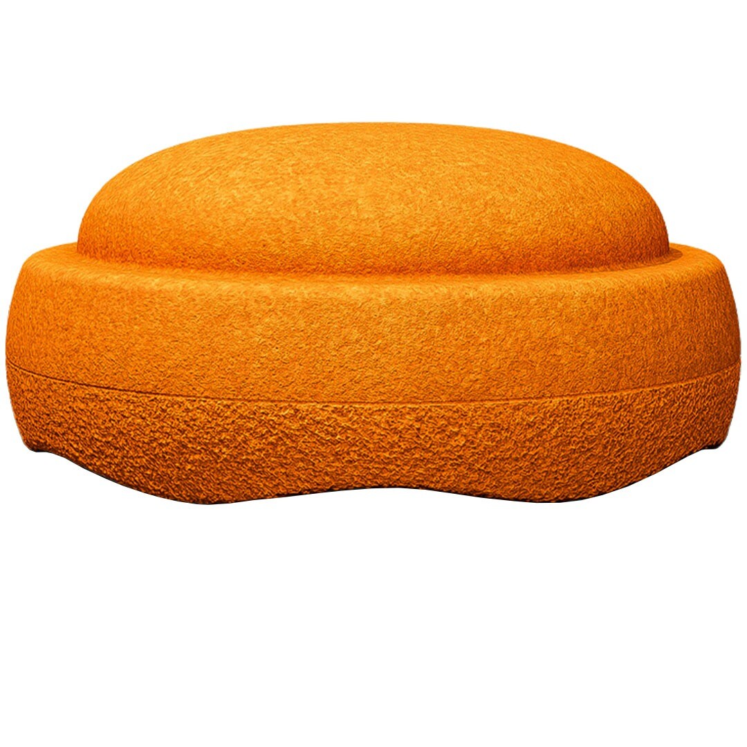 Een schuin bovenaanzicht van een oranje stapelstein original GROW schuimrubberblok.