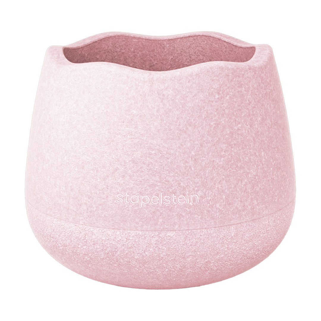 Stapelstein roze stapelblok met textuur en logo.