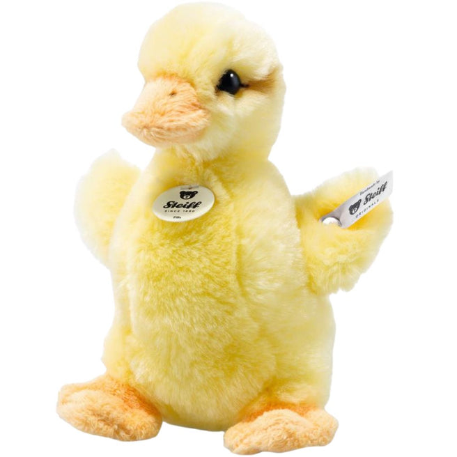 Steiff gele pluchen knuffeleend Pilla met merklabel.