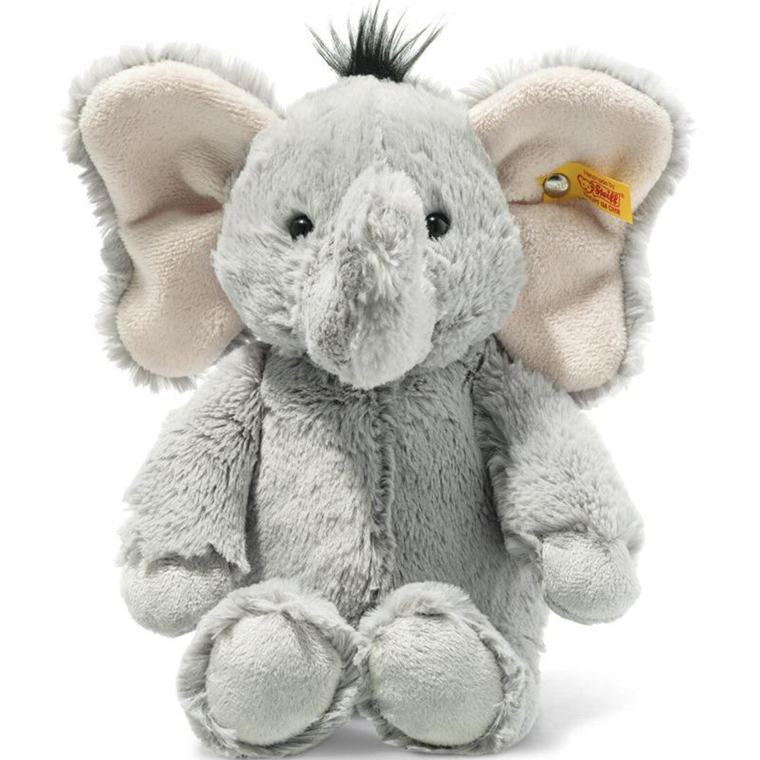 Steiff knuffelolifant Ella zittend met gele tag aan het oor.