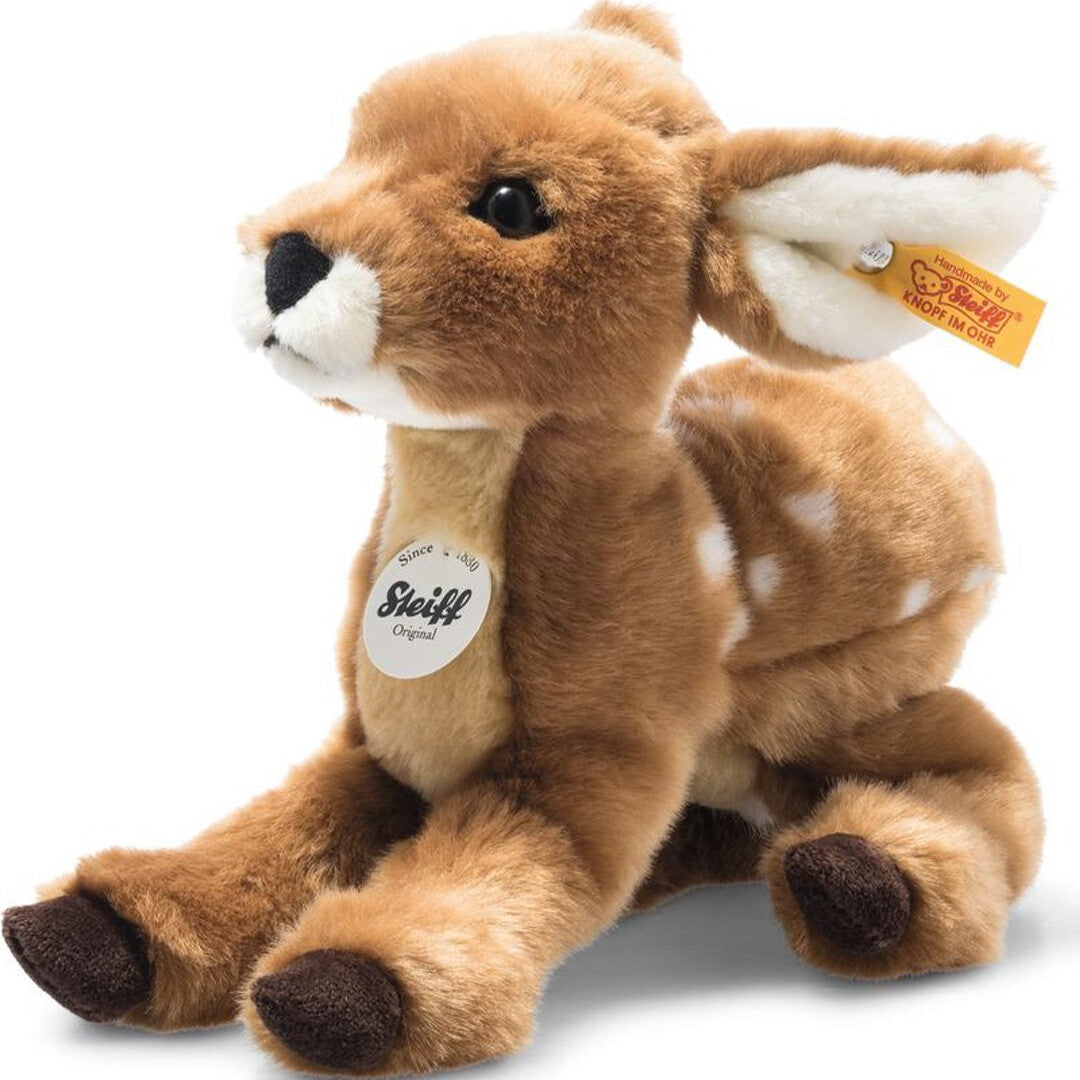 Steiff pluchen ree Romy zit schuin afgebeeld.