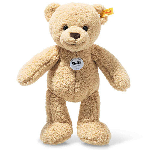 Steiff pluchen teddybeer Ben in beige kleur, staand afgebeeld.