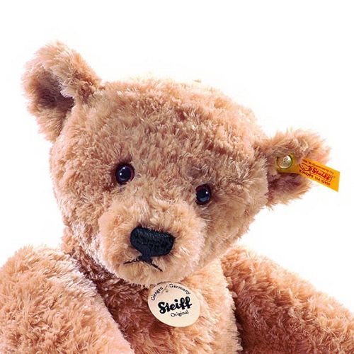 Detailopname van de kop van de Steiff beige pluchen teddybeer Elmar.