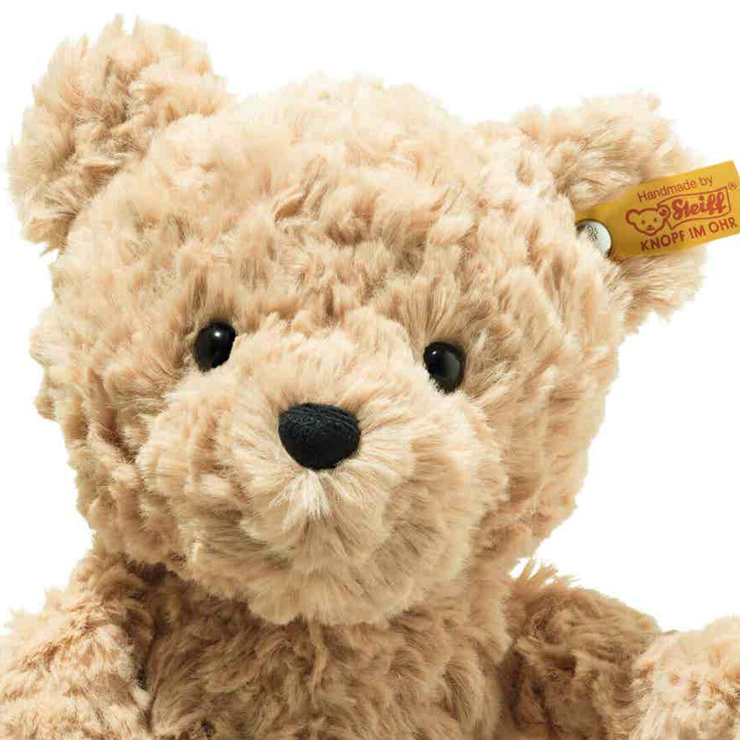 Detailopname van het gezicht van de Steiff pluchen teddybeer Jimmy.