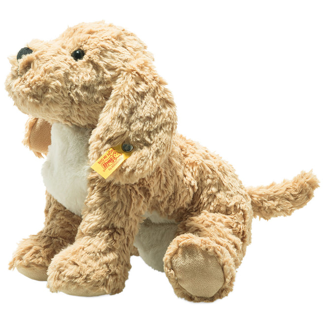 Steiff pluchen knuffelhond Goldendoodle in beige kleur, zittend.
