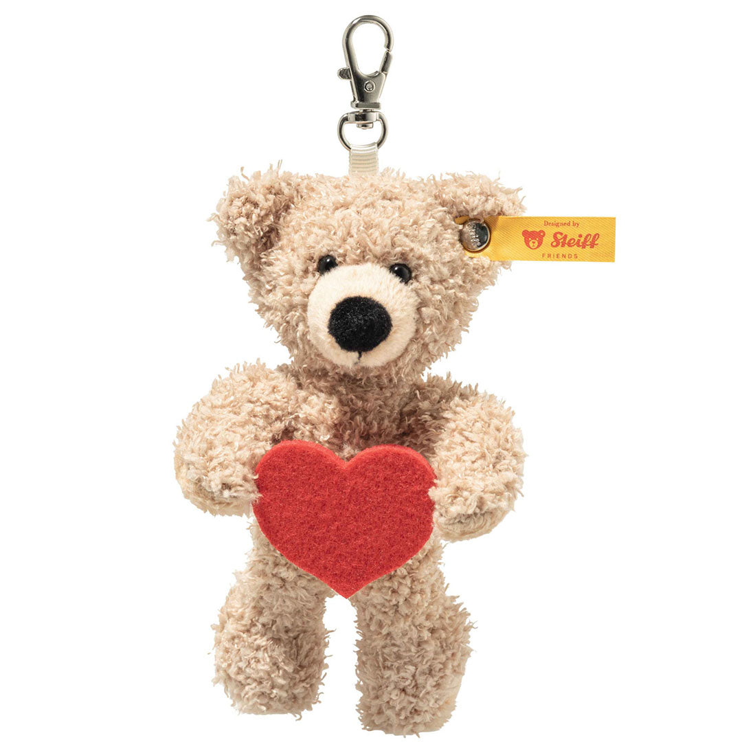Steiff teddybeer sleutelhanger met beige pluche en een rood hart.