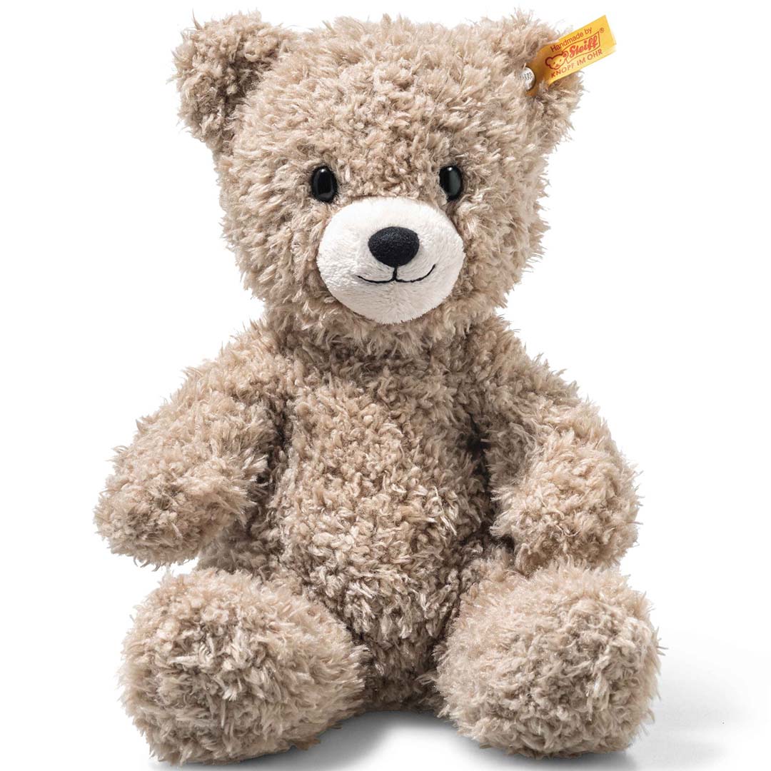 Steiff pluchen teddybeer Caspar in beige kleur, zittend op een witte achtergrond.