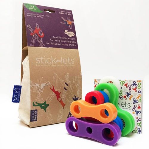 De stick-lets dodeka fort kit verpakking met een stapel veelkleurige connectors en een instructieboekje.