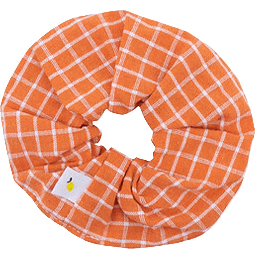 Sticky Lemon kinder scrunchie met oranje geruit patroon.
