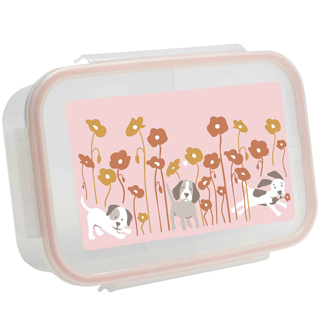 Sugarbooger bento lunchbox met een roze deksel en een decoratie van puppies en bloemen.